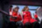Elodie Bonafous aboard her IMOCA with children from the Petits Princes Association