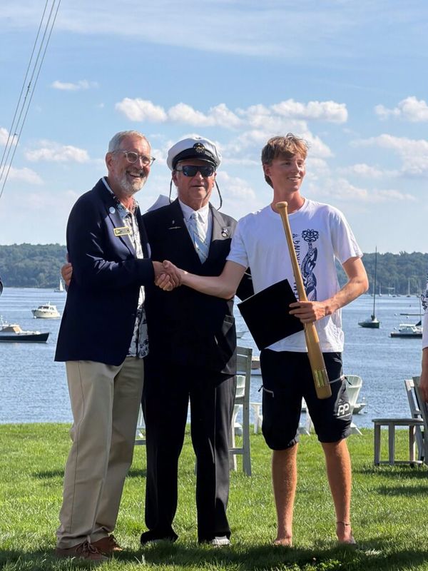 From left: Tom Camp (Congressional Cup 2027 Chair), Julian Fisher II (Commodore, Seawanhaka Corinthian Yacht Club) and Josh Hyde, winner of the 2026 Grand Slam.