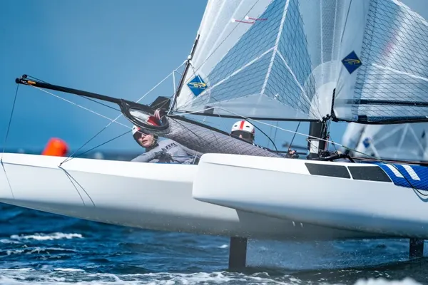 Nacra 17 sailors Micah Wilkinson and Kate Stewart recovered well after a DNF in their opening race.