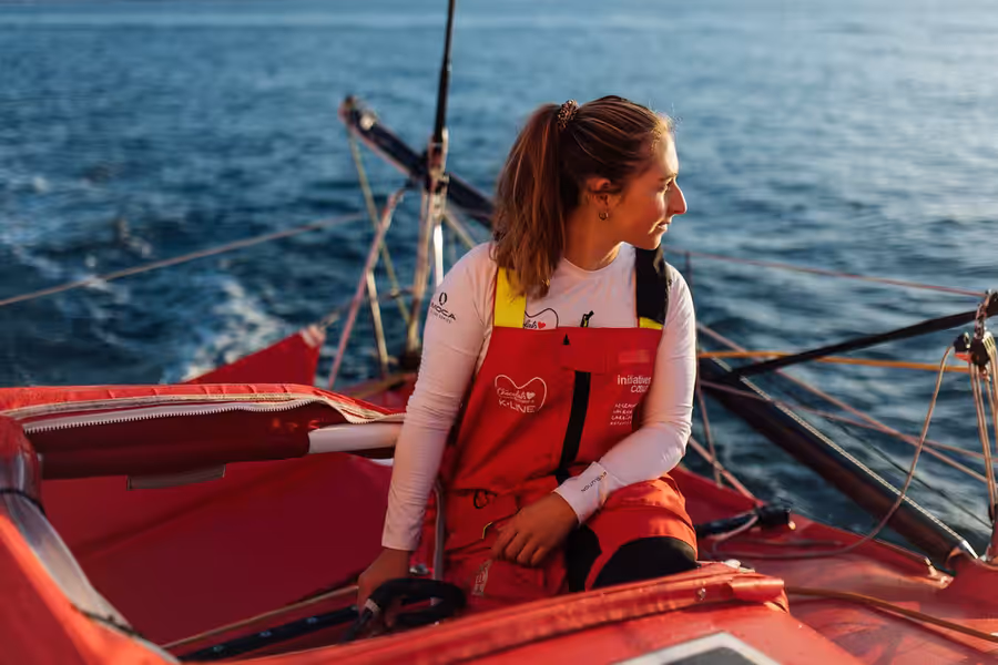 Violette Dorange at the helm of her IMOCA Initiatives Coeur.