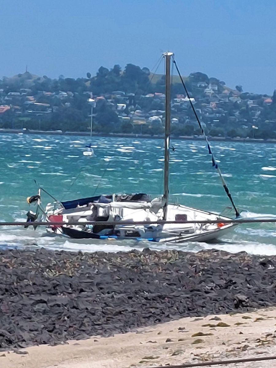 Grounded yacht today. Photo credit: Devonport Yacht Club facebook page