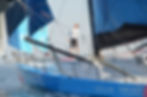 Pierre-Louis Attwell at the helm of his IMOCA Resilient. Photo: Sibylle Simon-Barboux