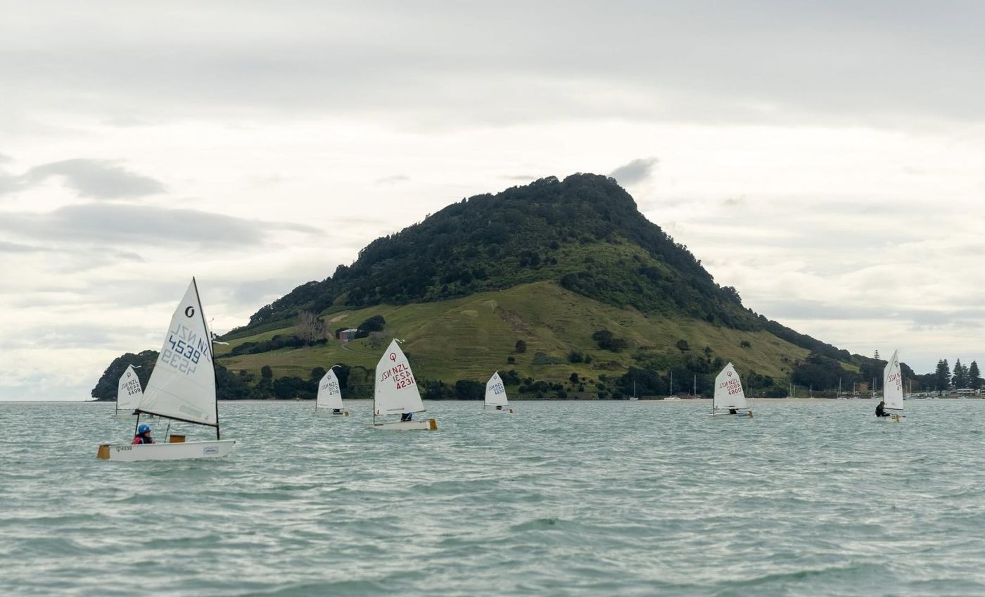Wells tops 70-strong Optimist fleet at Tauranga AIMS Games, 09 September 2026