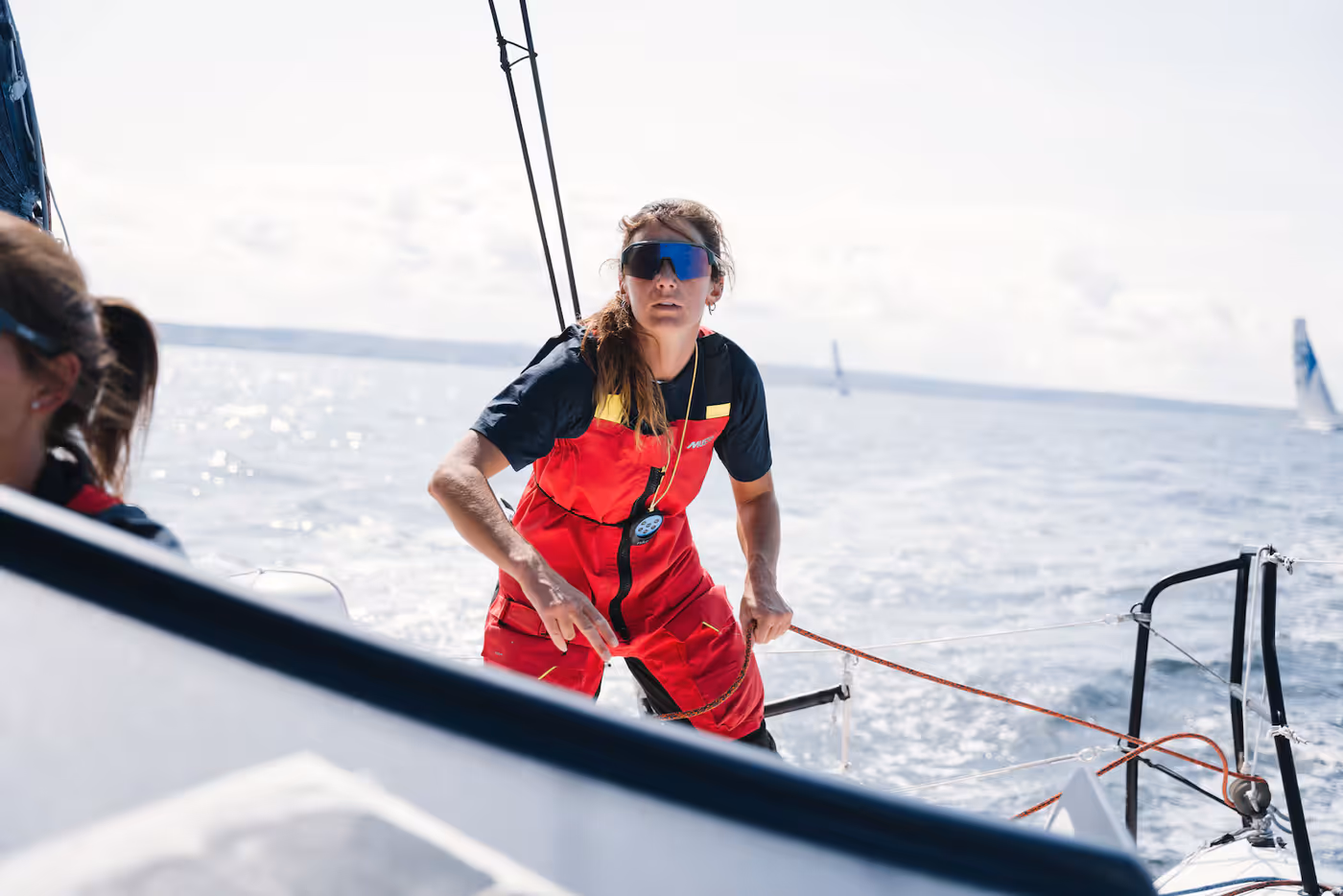 Pamela Lee sailing aboard her boat