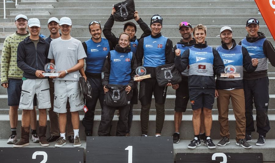 The winning crew celebrates after a tightly fought contest