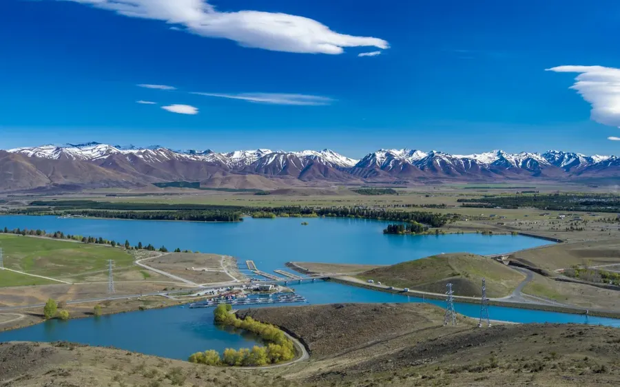 A-view-of-Lake-Ruataniwha-looking-towards-the-Twizel-township-and-Southern-Alps.-Photo-Photosport-.webp
