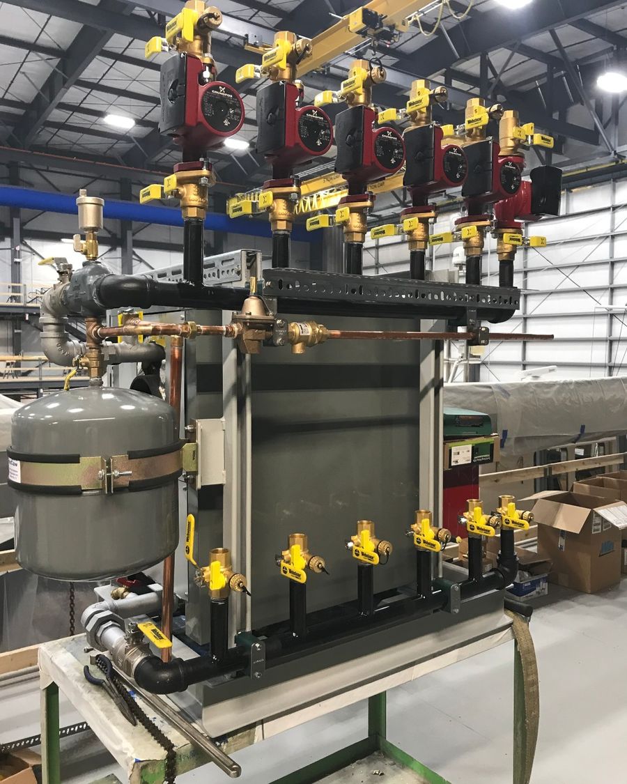 Assembling the boiler outsie the boat Image credit - Front Street Shipyard on Facebook