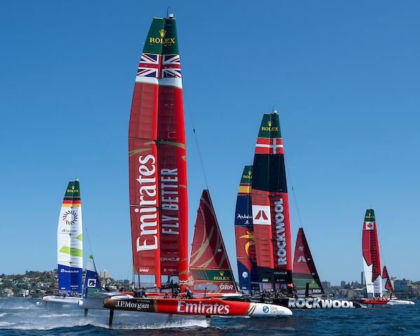 The SailGP fleet in action during practice racing with Emirates Great Britain SailGP Team helmed by Dylan Fletcher, and ROCKWOOL Denmark SailGP Team, ahead of the KPMG Australia Sail Grand Prix in Sydney, Australia. Friday 7 February 2025. Rolex SailGP Championship Event 3 Season 2025. Photo: Bob Martin for SailGP. Handout image supplied by SailGP