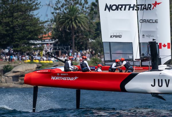 Canada NorthStar SailGP Team helmed by Giles Scott sails past Shark Island ahead of racing on Race Day 1 of the KPMG Australia Sail Grand Prix in Sydney, Australia. Saturday 8 February 2025. Rolex SailGP Championship Event 3 Season 2025. Photo: Bob Martin for SailGP. Handout image supplied by SailGP