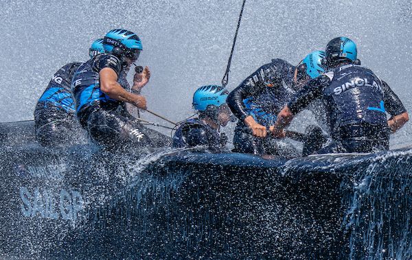 Blair Tuke, co-CEO and wing trimmer of the New Zealand SailGP Team, and New Zealand SailGP Team helmed by Peter Burling hit a wave during a practice session ahead of the KPMG Australia Sail Grand Prix in Sydney, Australia. Friday 7 February 2025. Rolex SailGP Championship Event 3 Season 2025. Photo: Bob Martin for SailGP.