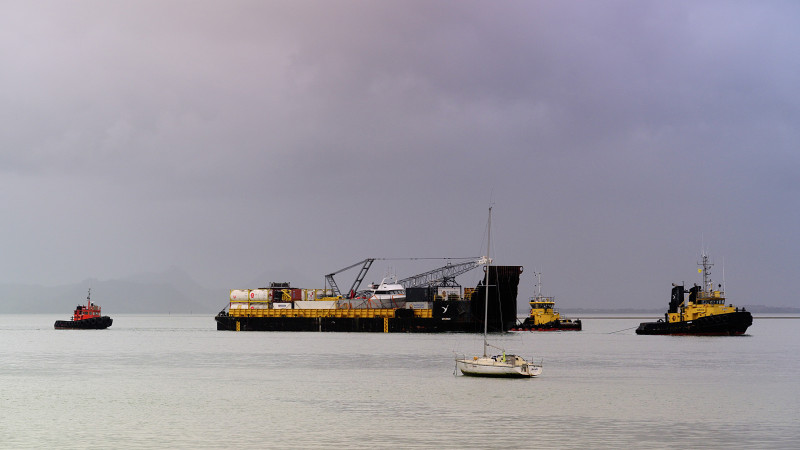 The salvor's tug and barge return to Whangarei.
