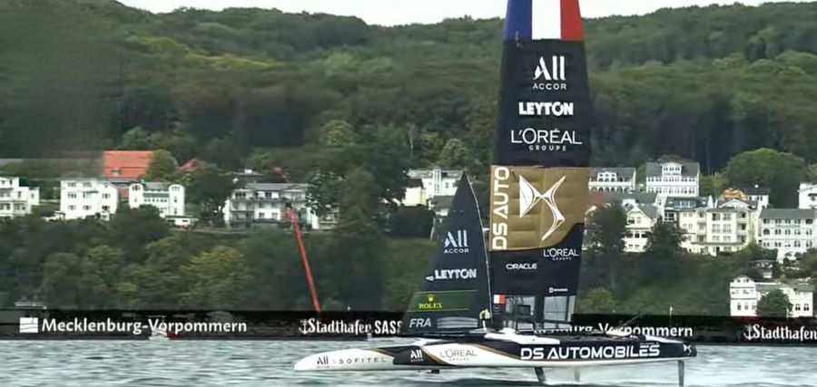 DS Team France survive a wild middle stretch to beat Black Foils NZ in Group A's second race