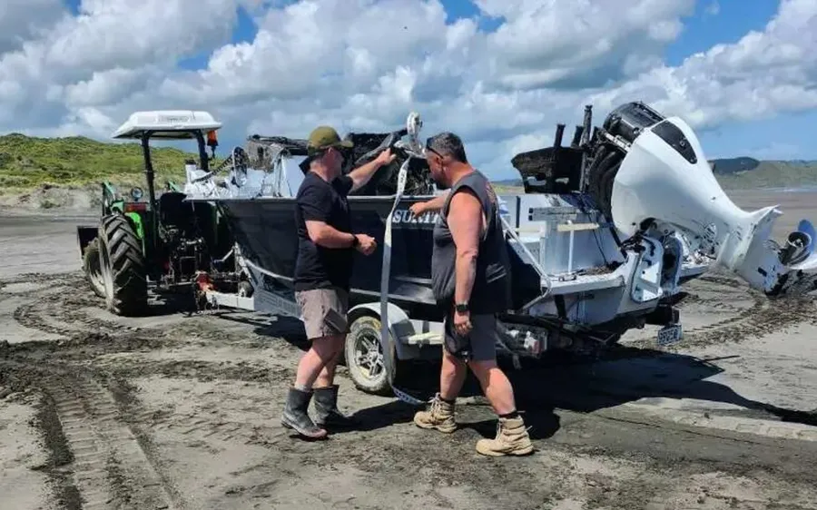 Darren-Teague-and-his-boat-that-capsized-on-the-Raglan-Bar-on-1-November.-Photo-Supplied-.webp