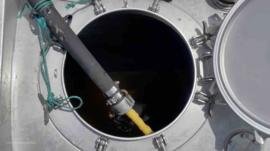 Diesel fuel, lubricating oil, and seawater pumped from the wreck to massive holding tanks. Photo credit: NZDF