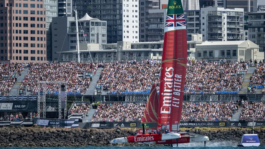 Emirates GBR racing in Auckland in front of a packed stand / Credit: SailGP