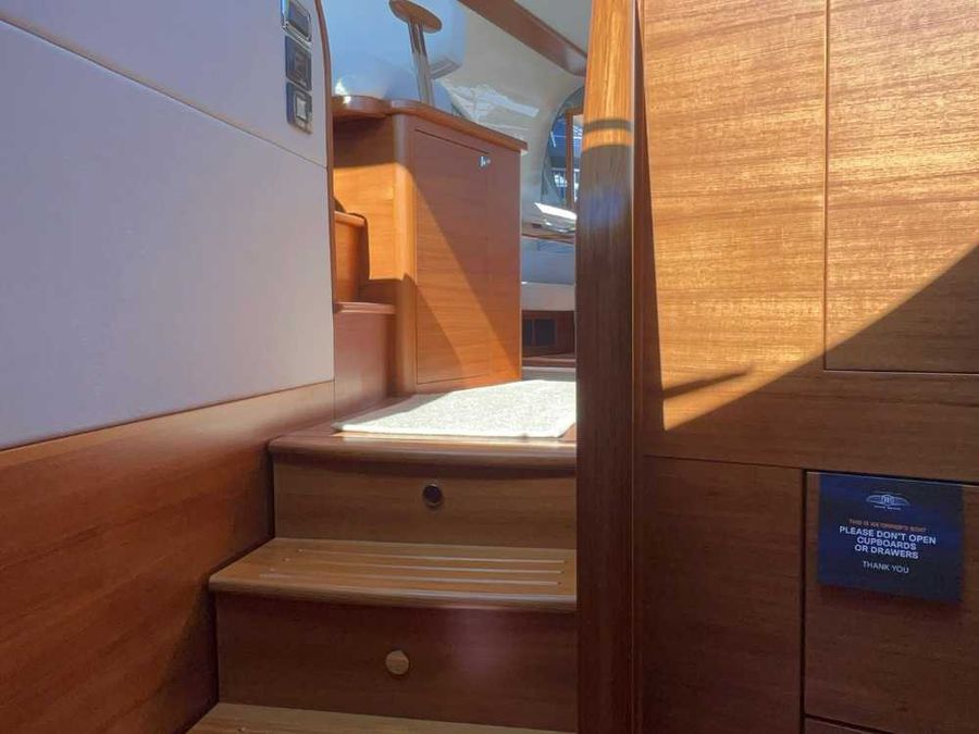 Even the smallest details—like tiki-effect flooring and hidden storage beneath the stairs—have been carefully considered