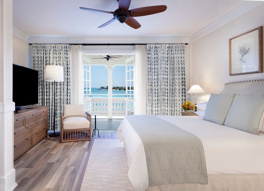 A Pier House guest room, complete with a balcony overlooking the water