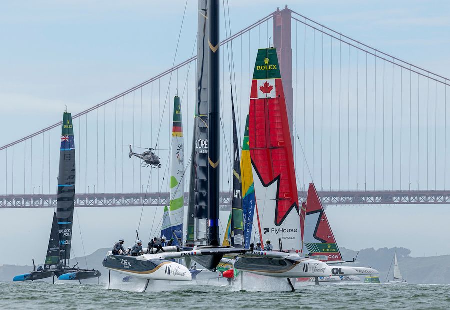 France ahead of Canada NorthStar SailGP Team helmed by Giles Scott and Germany SailGP Team presented by Deutsche Bank helmed by Erik Heil as they pass the Golden Gate Bridge on Race Day 1 of the Oracle San Francisco Sail Grand Prix held in San Francisco, California, USA. Saturday 22 March 2025. Rolex SailGP Championship Event 5 Season 2025. Photo: Felix Diemer for SailGP.