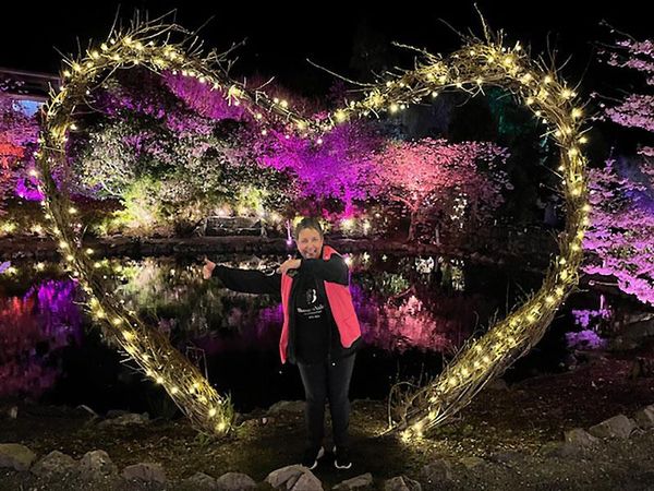 Fiona-Rammell-in-amongst-the-blossoms-photo-Awanui-NZ.jpg