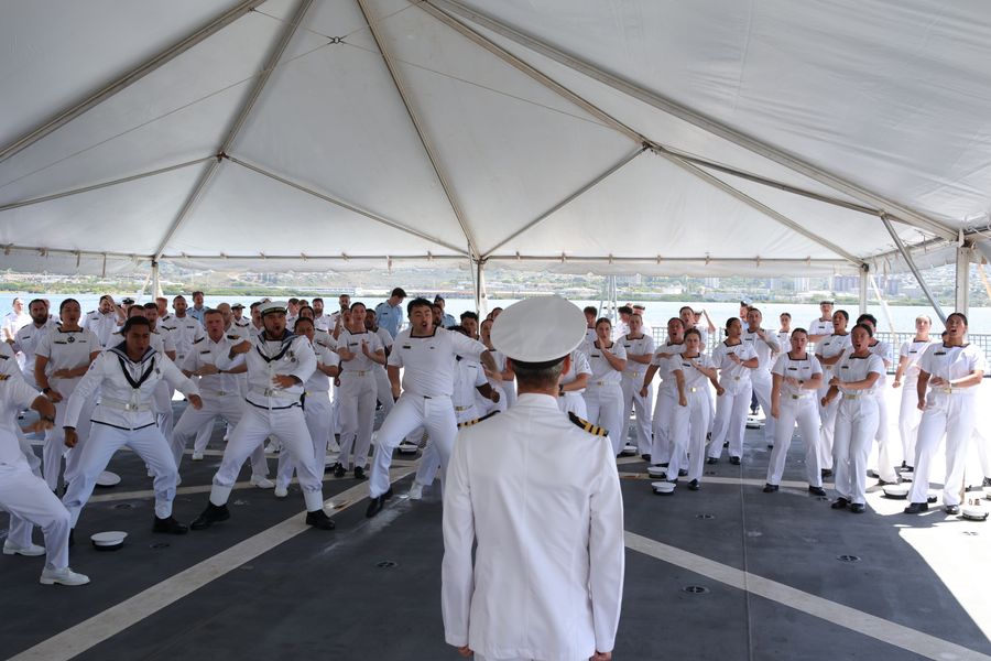 Former Commanding officer of HMNZS Aotearoa, Commander Rob Welford, receives a haka from the ship’s company following the change of command ceremony