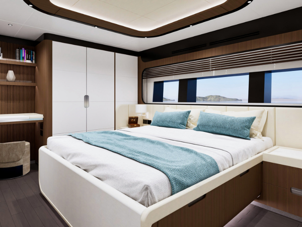 One of the GX42’s guest cabins, with warm timber finishes, large hull windows and a clean, contemporary interior.
