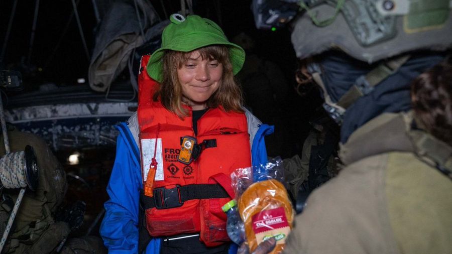 Greta Thunberg receives food as the ship is safely transferred to port. Photo credit- x.com @EretzIsrael