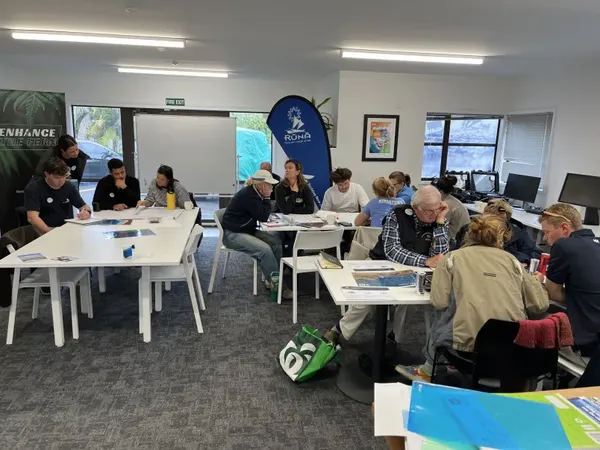 Members gather at a RUNA hui to discuss the Hauraki Gulf monitoring project