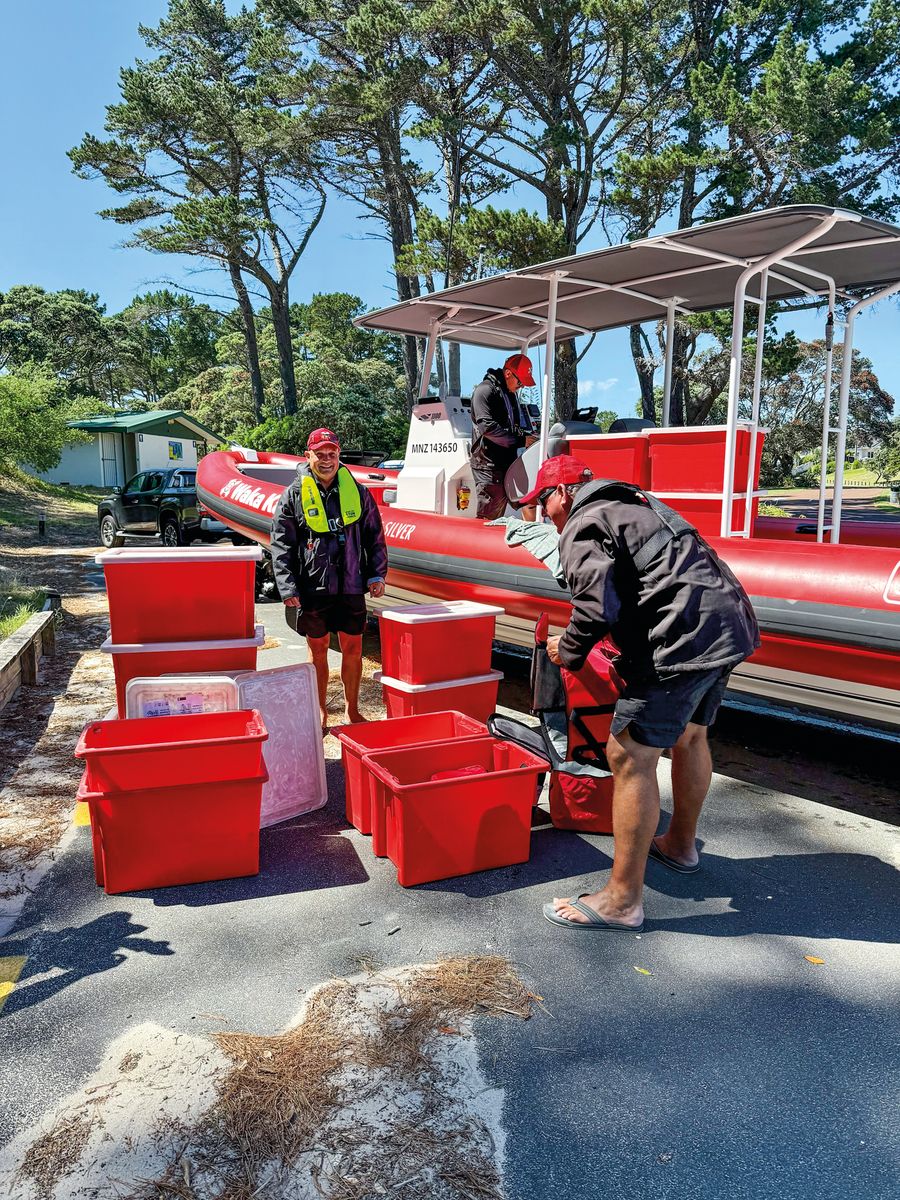 Loading Waka Kai for a routine grocery delivery run