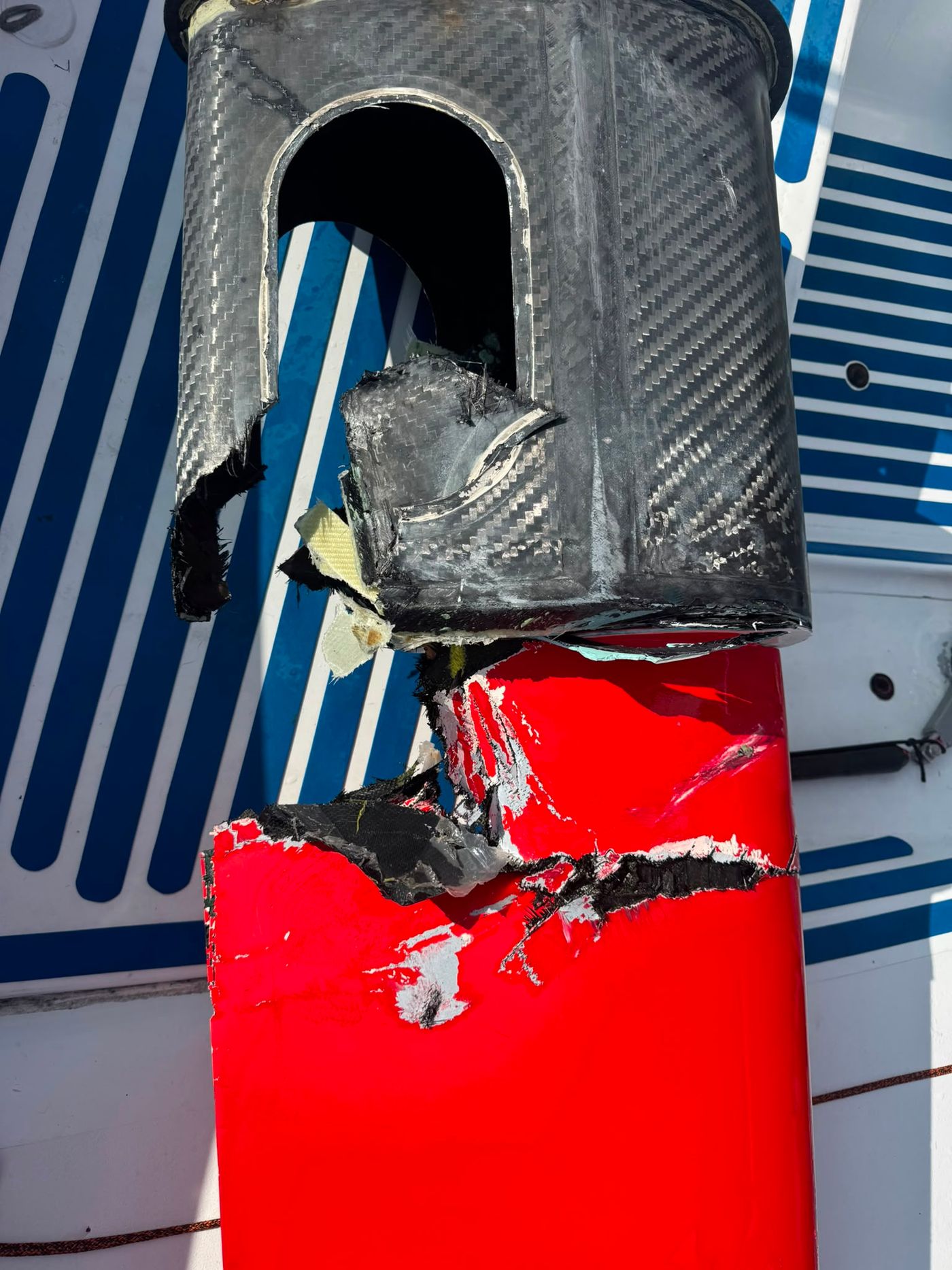 Impact damage to MSIG Europe's rudder, with the carbon fibre laminate torn through above the shaft join. Photo: Aotearoa Ocean Racing