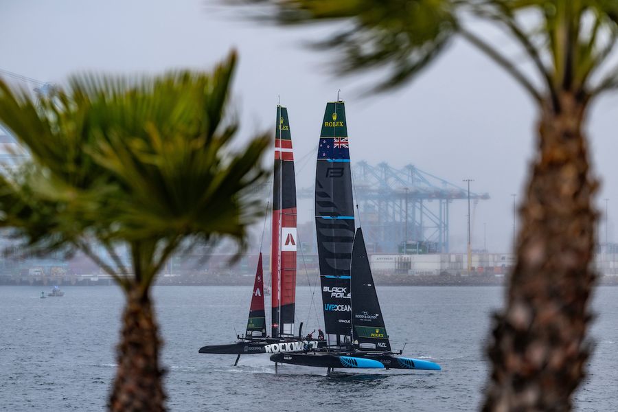 New Zealand SailGP Team helmed by Peter Burling sail close past ROCKWOOL Denmark SailGP Team helmed by Nicolai Sehested during practice racing ahead of the Rolex Los Angeles Sail Grand Prix held in the Port of Los Angeles, California, USA. Friday 14 March 2025. Rolex SailGP Championship Event 4 Season 2025. Photo: Jed Jacobsohn for SailGP. Photo credit: SailGP media