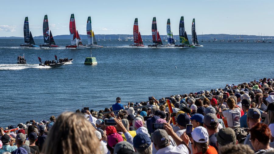 The F50 fleet races before packed stands at the Sassnitz venue during the 2025 SailGP season.