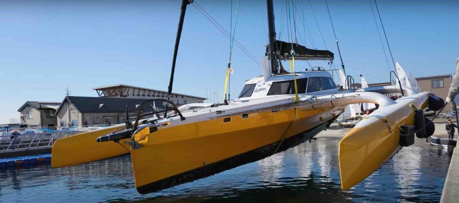 Lifting La Vagabonde out of the water in Japan, time for repairs. Photo credit: LVB
