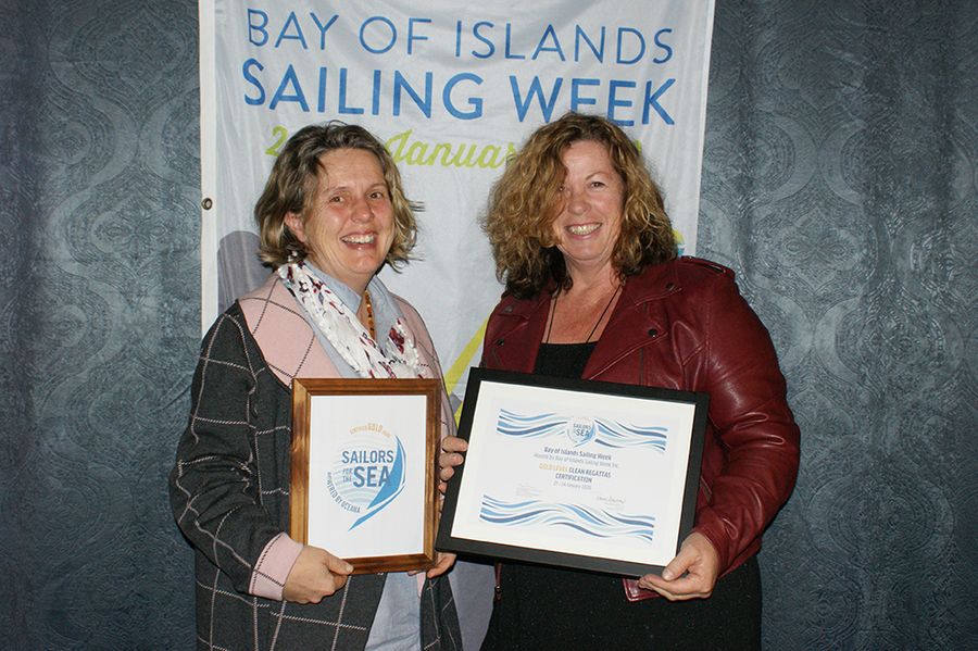 Manuela Gmuer-Hornell (left) and Cath Beaumont (right) display the Gold Level Clean Regatta certification awarded to Bay of Islands Sailing Week.