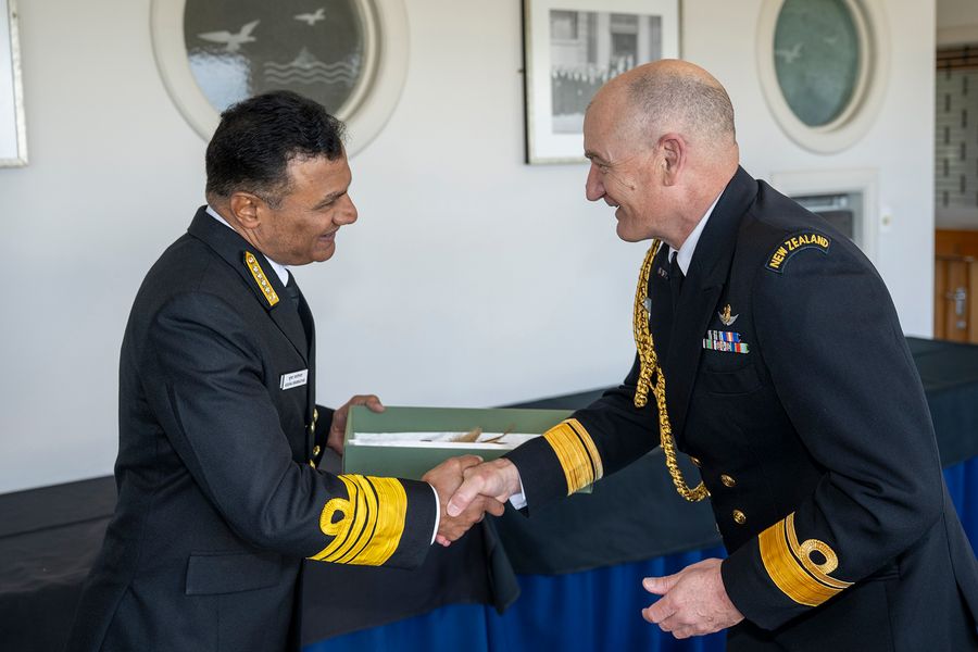 New Zealand's Chief of Navy, Rear Admiral Garin Golding ,(right) greets Chief of the Naval Staff India, Admiral Krishna Swaminathan, at Devonport Naval Base