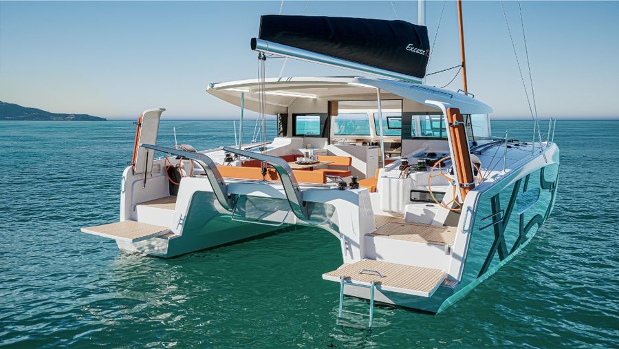One of the Excess 13 standout features is the fold-down sugar-scoops at the stern, providing easy access to the water—ideal for everything from diving to wing foiling.