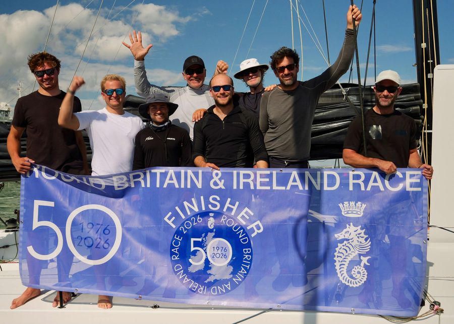 Palanad 4 line up for the team photo after crossing the line - Team- Antoine Magre, Erwann Le Mené, James Murphy Jean-Philippe Saliou, Joss Creswell, Oakley Marsh, Pablo Santurde del Arco, Sam Manuard