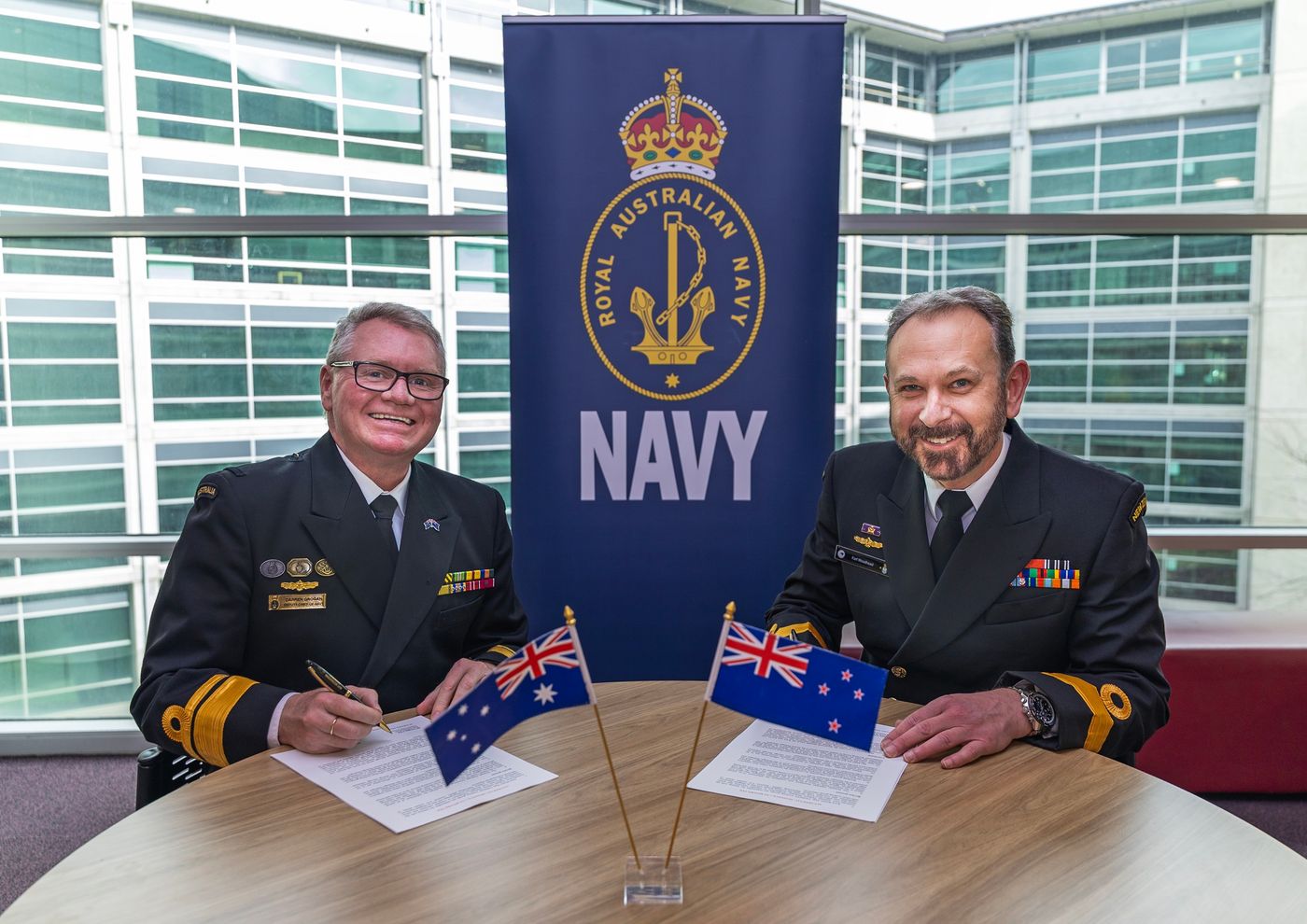 Deputy Chief of the Royal New Zealand Navy, Commodore Karl Woodhead (right), and Deputy Chief of the Royal Australian Navy, Rear Admiral Darren Grogan