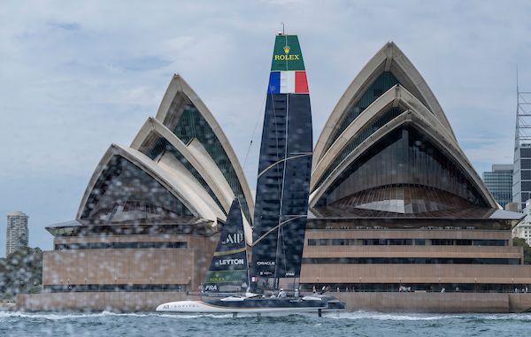 France SailGP Team F50 catamaran is towed to the course as it passes the Sydney Opera House on Race Day 1 of the KPMG Australia Sail Grand Prix in Sydney, Australia. Saturday 8 February 2025. Rolex SailGP Championship Event 3 Season 2025. Photo: Ricardo Pinto for SailGP.