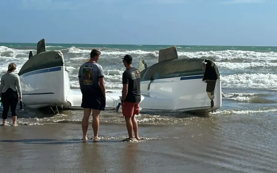 Rescuers-came-to-the-add-of-a-capsized-yacht-on-Sandy-Bay-Beach-in-Northland.-Photo-Supplied-2.webp