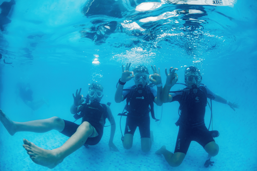 Kids try their hand at diving in the Andark Dive Tank