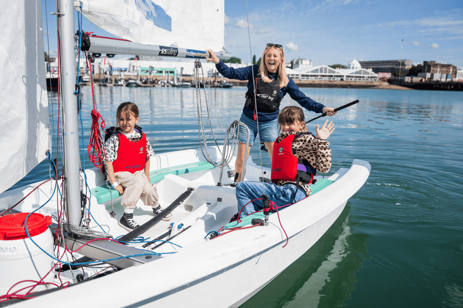 A family enjoys a day out on the water