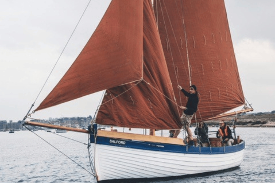 One of the classic wooden boats available for a hands-on adventure
