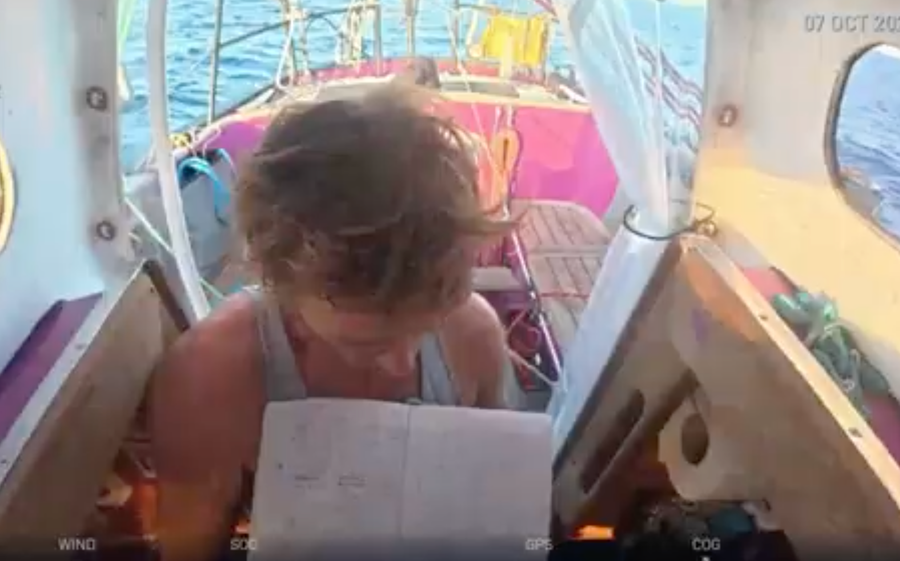 Etienne Messikommer holds up his logbook, with Éloïse's hair visible on the page