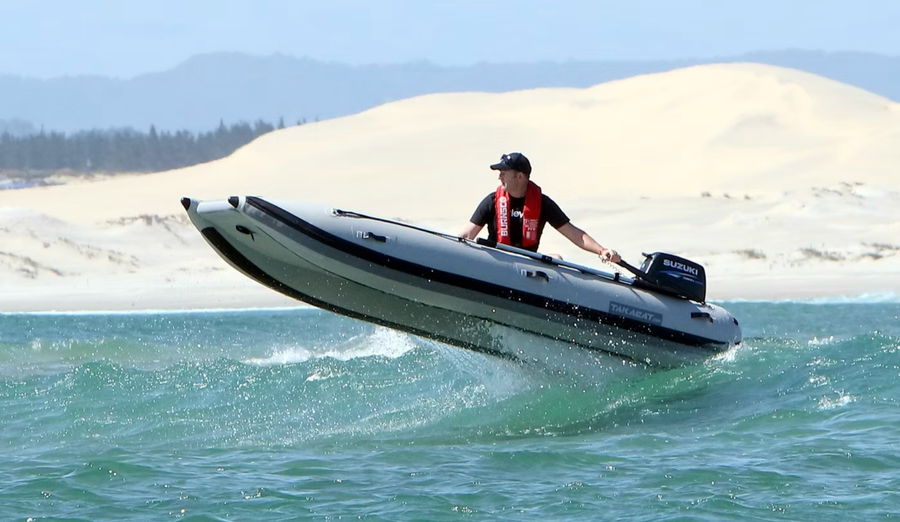 Takacat is a light weight, low resistance catamaran hull design provides quick and level planning. Photo credit: Takacat