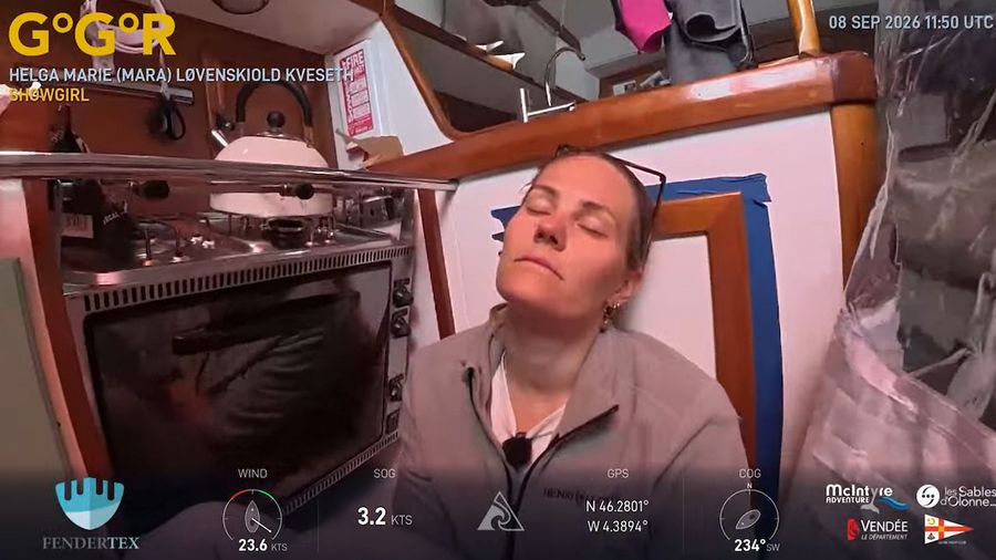 Norway's Helga Marie 'Mara' Løvenskiold Kveseth rests below aboard Showgirl after a tough Biscay crossing brought headwinds, rough seas and seasickness.