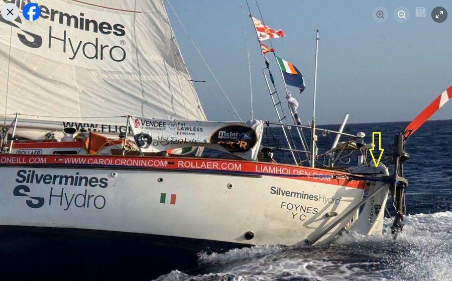 Pat Lawless's Silvermines Hydro, with the yellow arrow marking the stern steering-gear area. A Solent stay failure and tiller-to-rudder-head issues ended his GGR challenge, and he's now retired and heading north to the Cape Verde Islands.