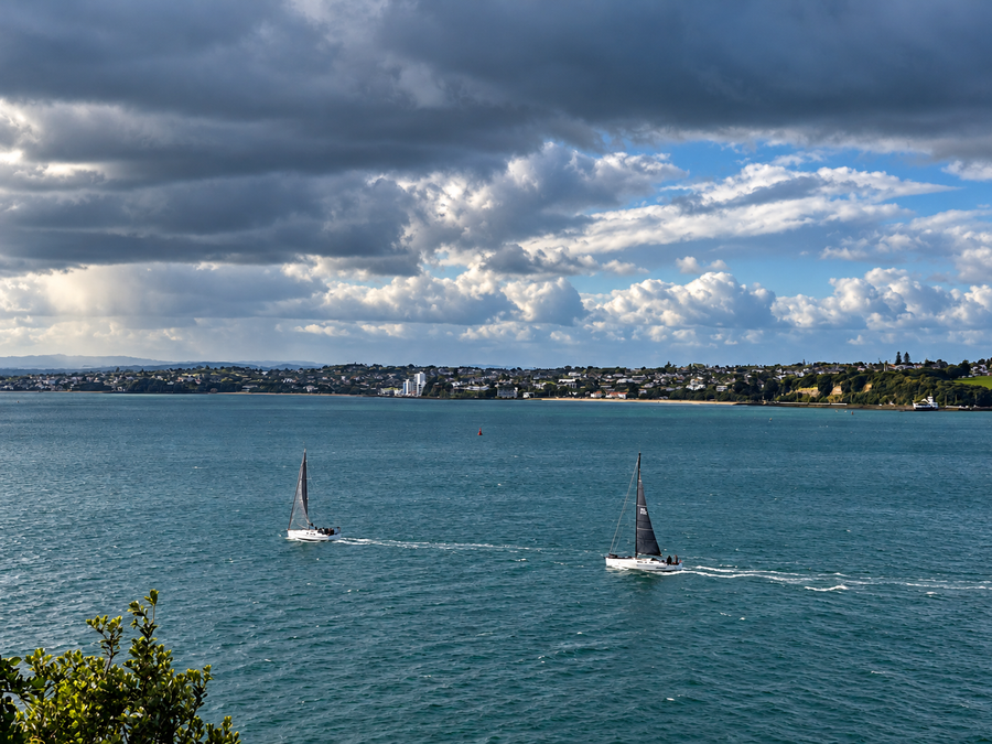 Some of the 2026 Spring Regatta (Richmond Yacht Club) fleet heading out to the start line at the south-west corner of Rangitoto Island.