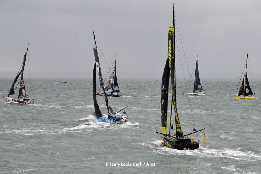 Start-line-of-the-2025-Transat-Café-LOR.-The-IMOCA-Fleet-sail-out.-Photo-credit-Jean-Louis-CarliAlea.jpeg