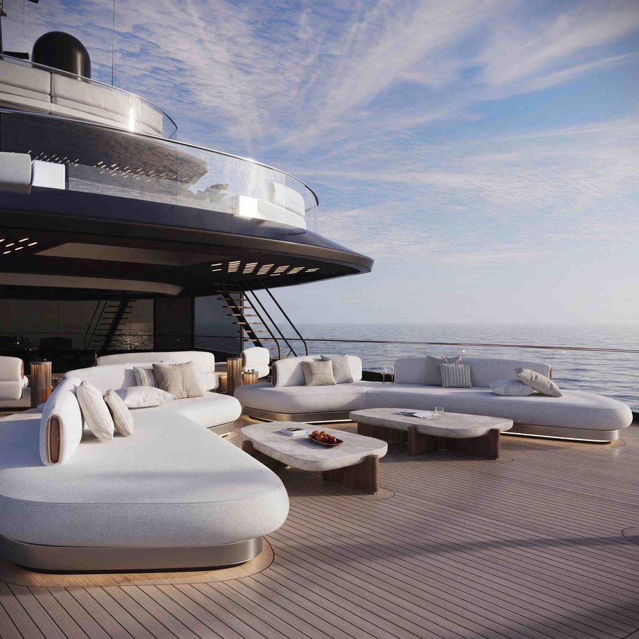 The ISA Essence 82m’s open aft deck, with sweeping glass balustrades, broad lounge seating and an uninterrupted outlook over the water.