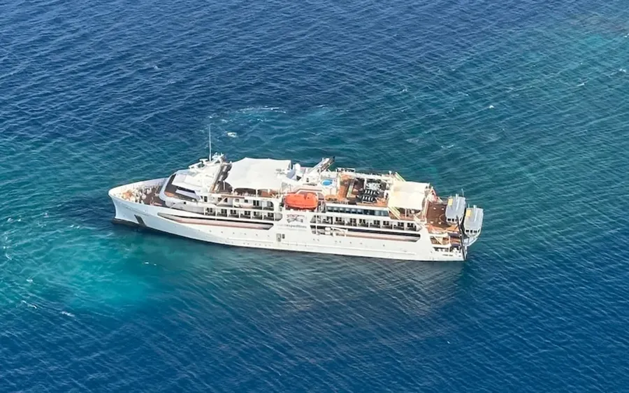 The-Coral-Adventurer-had-more-than-120-people-aboard-when-it-hit-a-reef-at-Dregerhafen-Point-Papua-New-Guinea.-Photo-Supplied-Jurgen-Ruh-ABC-.webp